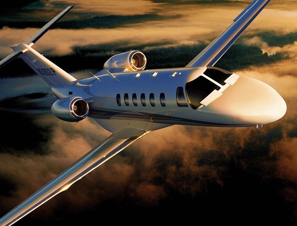 Cessna Citation CJ2+ jet in sunset sky