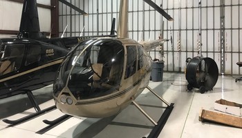 Robinson R44 Raven II inside hangar