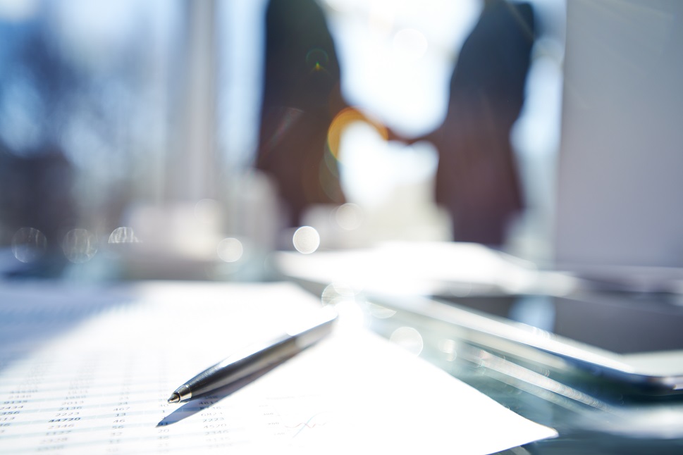 Business people shake hands on a business deal